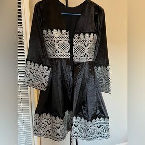 Velvet coat can be worn with pent or on any dress